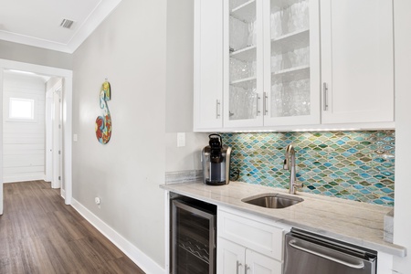 Wet bar with wine cooler and standalone ice maker