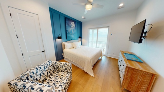 Bedroom #5 is in the 3rd floor with a king bed, TV, private bathroom, Gulf views and balcony access