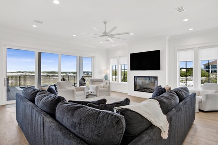The sliding glass doors open the length of the living room wall