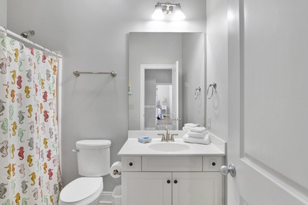 1st floor shared bath with a tub/shower combo