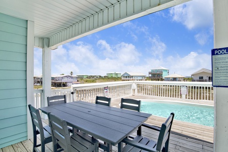 Enjoy meals outdoors under the covered porch with seating for 6