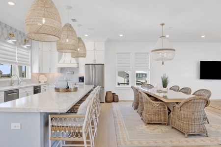 Ample seating at the dining table and kitchen island