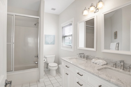 Bedroom 4 private bath with shower/tub combo and dual sinks