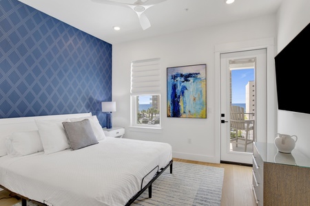 Guest bedroom 3 offers a TV and King bed, sleeps 2