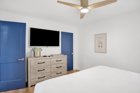 The primary bedroom has a TV and attached bathroom
