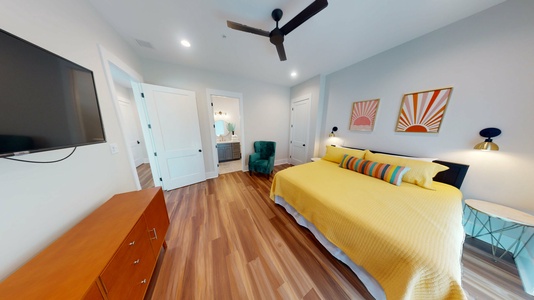 2nd floor master bedroom has a king bed, private bathroom, TV, Gulf views and balcony access