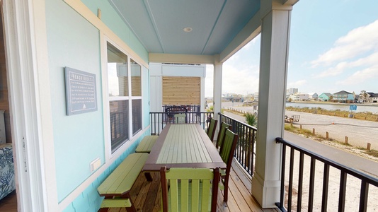 Outdoor dining on the covered balcony