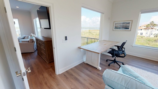 The Master bedroom leads into a private seating area on the top floor