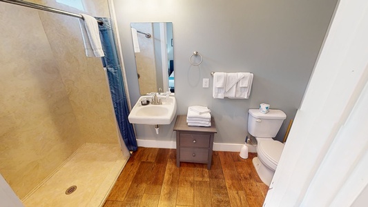 The private bathroom in Bedroom 2 can accommodate a guest who uses a wheelchair