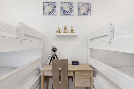 Bedroom 3 can accommodate 8 guests and offers a TV