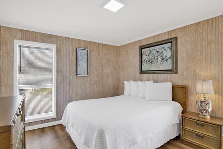 The master bedroom offers a Queen bed and private, attached bathroom