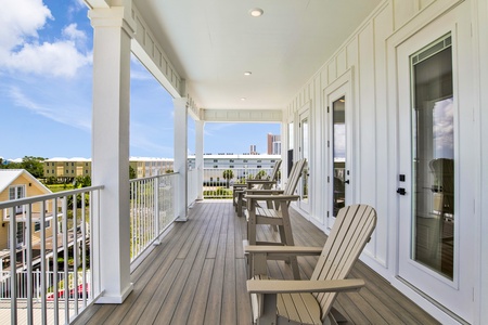 The balcony overlooks the pool