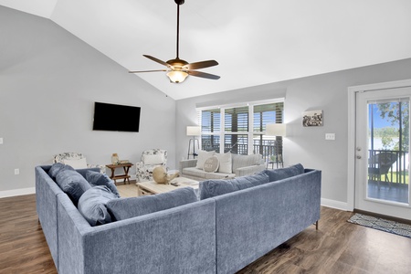 Large living area with room to spread out and a mounted TV