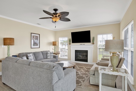 Living room has balcony access with views of the Little Lagoon