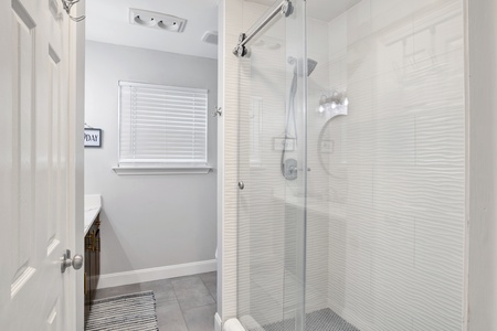 Shared hall bath with a walk-in shower