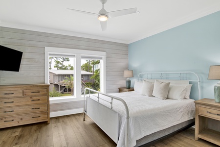 Bedroom 7 offers a private bathroom, balcony access, TV and King bed, sleeps 2