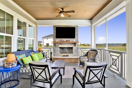 Covered, screened in balcony offers additional living space