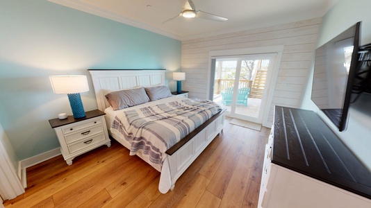 Bedroom #6 is on the 2nd floor with a king bed, water views, balcony access, TV and a private bathroom