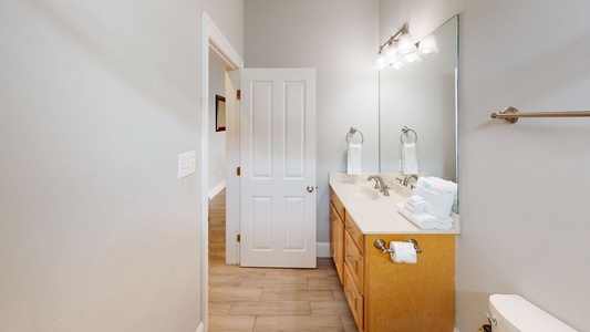 2nd floor hall bathroom with a tub shower combo