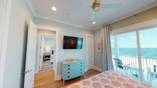 Bedroom #1 comes with a TV, balcony access, gulf views and a private bathroom