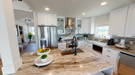 Island in the kitchen with barstools