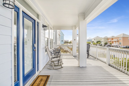 Enjoy the coastal breezes from the covered porch