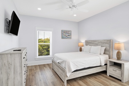 Summertime Blues II-Bedroom 4 on the 2nd floor with a queen bed, ceiling fan, TV and a private bathroom