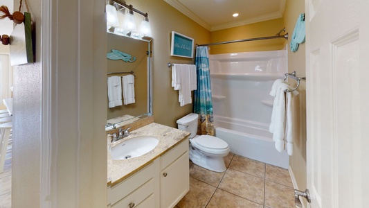 Shared hall bathroom for bedrooms #2 and #3 has a tub/shower combo