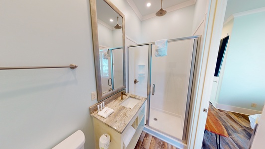 The private Master bathroom has a walk-in shower