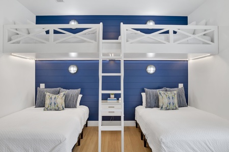 Guest bedroom 5 offers 2 Twin over 2 Queen beds, sleeps 6