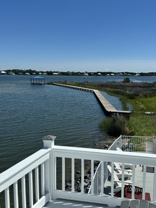 Sitting directly on the Little Lagoon in Gulf Shores