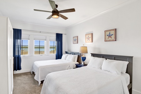 Bedroom 5 offers a half bathroom, TV and 2 Full beds, sleeps 4