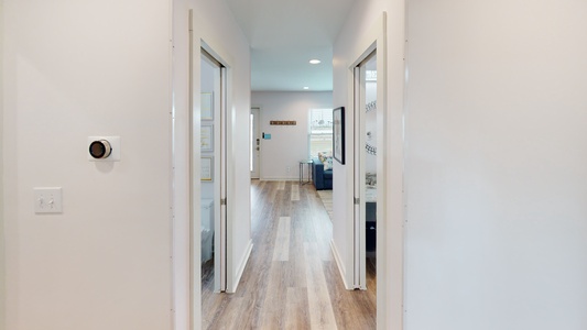 This hall leads to the 3 bedrooms and the 2.5 bathrooms