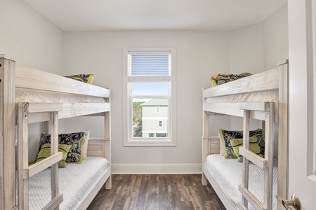 Bunk room attached to the master bath with 2 twin bunk beds