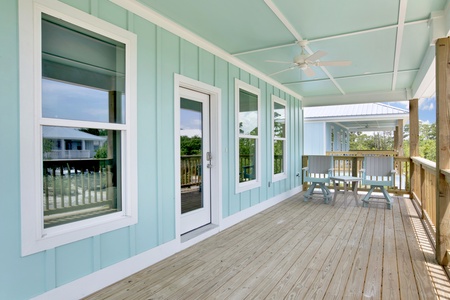 Large covered deck with outdoor seating