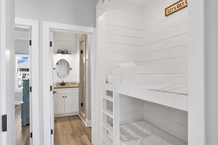 Two Twin beds located in the hallway