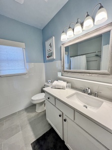 The hall bathroom features a tub/shower combo