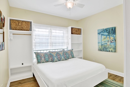 Guest bedroom 2 offers a King bed and TV, sleeps 2