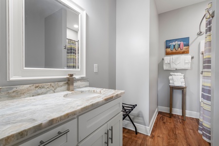 The bathroom in Bedroom 4 has a tub/shower combo