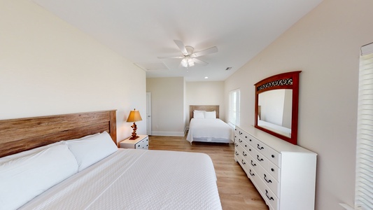 Kiran-A101-Second floor Bedroom 2 with 2 queen beds and a TV