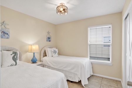 Bedroom #3 features 2 twin beds.