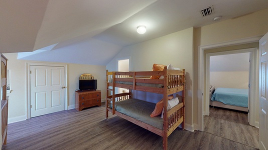Bedroom 5 has 1 king bed and 1 twin bunk bed