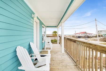 Covered deck with seating and Gulf views