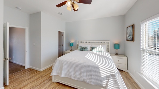 Bedroom 3 on the 2nd floor features a king bed and a ceiling fan