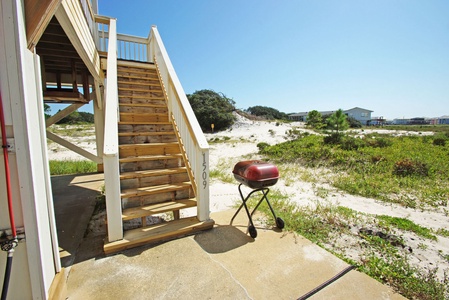 Charcoal grill and stairs to deck