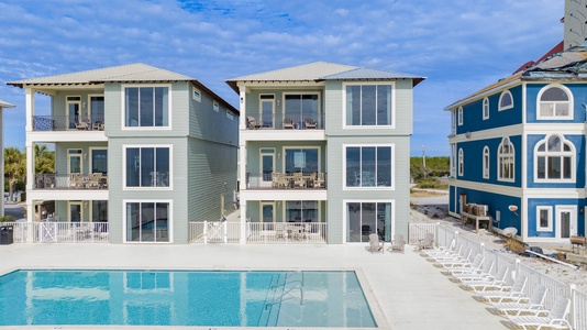 Soak up the sun at the community pool in one of the loungers