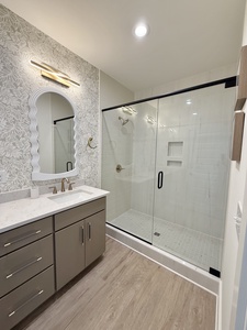Featuring a walk-in tile shower