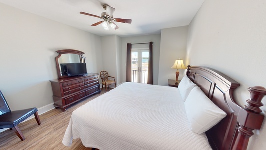 1st floor Bedroom 3 comes with a queen bed, ceiling fan, TV and a private bathroom