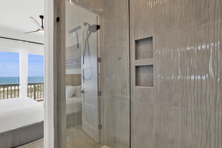 Featuring a walk-in tile shower