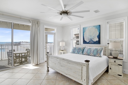 1st floor Bedroom 1 (Master) with a king bed, ceiling fan and TV